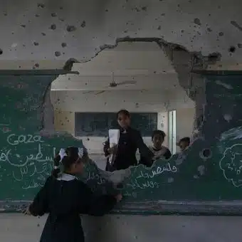 Photo: Anas al Baba/Oxfam – damaged school in Gaza, November 2014